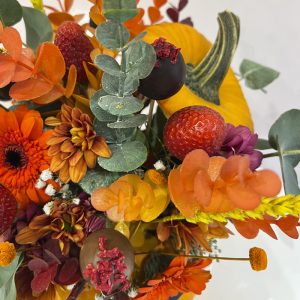 Bouquet de flores y frutas para Halloween